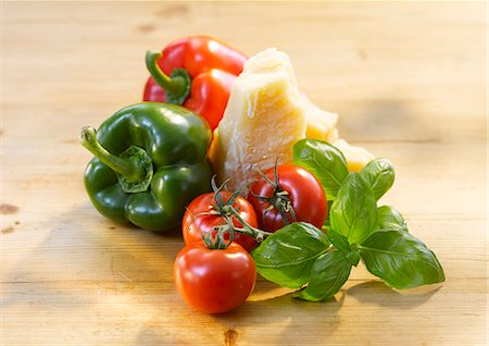 Tomatoes, peppers, basil and Parmesan cheese Stock Photo - Premium Royalty-Free, Code: 659-06184580