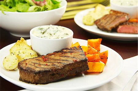 simsearch:659-08513145,k - Beef steak with butternut squash, creamed spinach and dill potatoes Stock Photo - Premium Royalty-Free, Code: 659-06184655