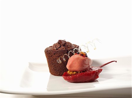 Pink pepper chocolate tart with tamarillos and guava sorbet Stock Photo - Premium Royalty-Free, Code: 659-06184712