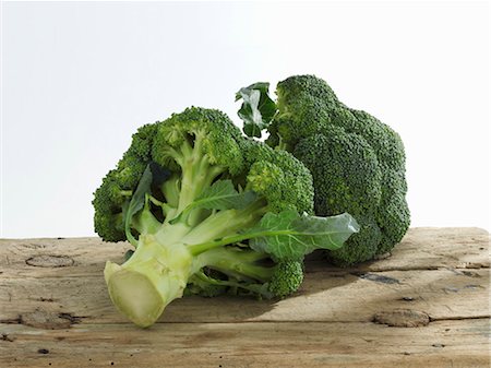 Fresh broccoli on a wooden board Stock Photo - Premium Royalty-Free, Code: 659-06184795