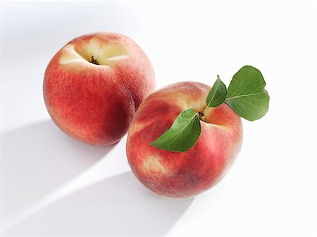 fresh peach - Two white-flesh peaches Stock Photo - Premium Royalty-Free, Code: 659-06184806