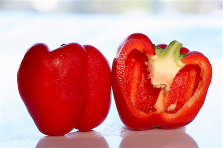 simsearch:659-07598758,k - A whole and a halved red pepper Stock Photo - Premium Royalty-Free, Code: 659-06184895