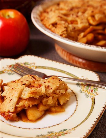 Piece of Homemade Apple Pie on a Plate Stock Photo - Premium Royalty-Free, Code: 659-06185142