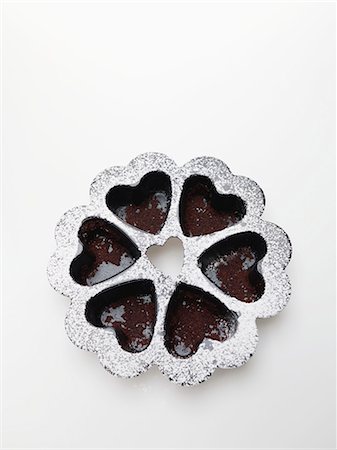 Baking mould for chocolate hearts Stock Photo - Premium Royalty-Free, Code: 659-06185174