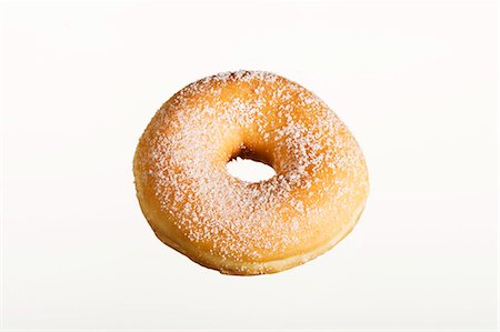 simsearch:659-01854280,k - A sugared doughnut Foto de stock - Royalty Free Premium, Número: 659-06185191