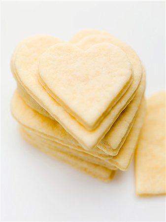 Several heart-shaped biscuits, stacked Stock Photo - Premium Royalty-Free, Code: 659-06185237