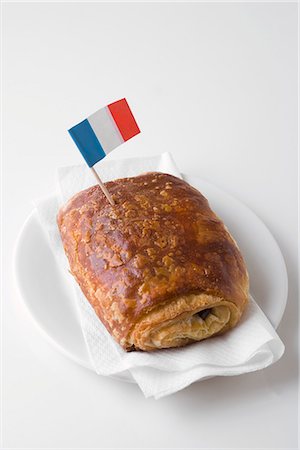 puff pastry turnover - Pain au chocolat with French flag Stock Photo - Premium Royalty-Free, Code: 659-06185339