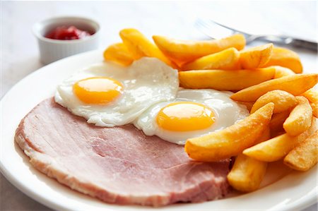 simsearch:659-01855436,k - Ham and eggs with chips Foto de stock - Sin royalties Premium, Código: 659-06185433