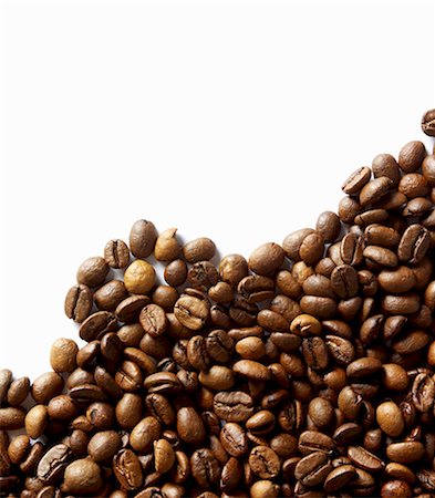 roasted bean - Coffee beans against white background Stock Photo - Premium Royalty-Free, Code: 659-06185451