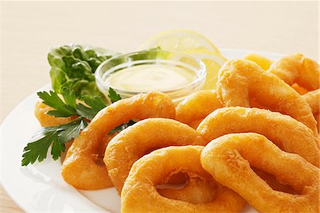 fried - Squid rings in batter Stock Photo - Premium Royalty-Free, Code: 659-06185473