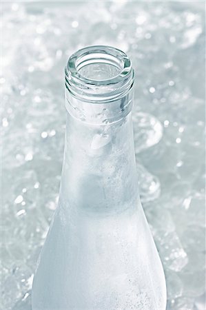 spirit bottle - Ouzo in icy bottle Stock Photo - Premium Royalty-Free, Code: 659-06185480