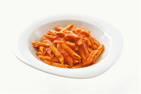 penne pasta with tomato sauce recipes - Penne with tomato sauce for children Stock Photo - Premium Royalty-Free, Code: 659-06185556