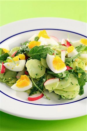 Potato salad with rocket, radishes and egg Stock Photo - Premium Royalty-Free, Code: 659-06185706