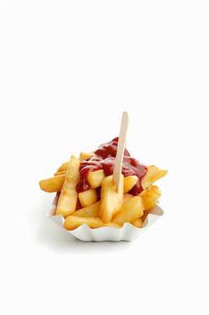patatas fritas - Chips and ketchup on a takeaway paper plate Foto de stock - Sin royalties Premium, Código: 659-06185762