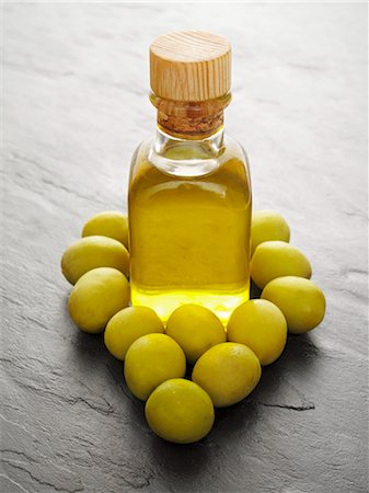 stone slab - Olive oil and green olives Stock Photo - Premium Royalty-Free, Code: 659-06185801