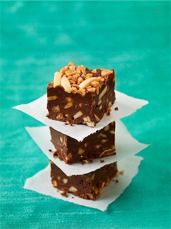 english cooking - Three Pieces of Chocolate Toffee Fudge; Stacked Stock Photo - Premium Royalty-Free, Code: 659-06185879