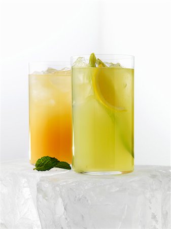 fruit juice cocktails - Two citrus fruit drinks Stock Photo - Premium Royalty-Free, Code: 659-06186139