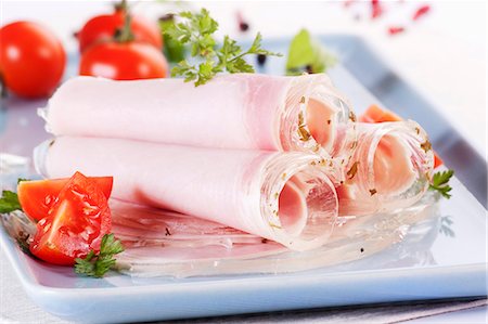 Rolls of ham in aspic with tomatoes Stock Photo - Premium Royalty-Free, Code: 659-06186168