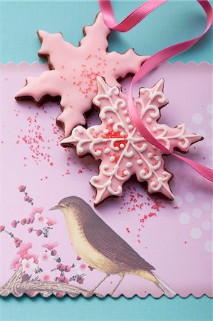 Christmas biscuits with pink icing Stock Photo - Premium Royalty-Free, Code: 659-06186353