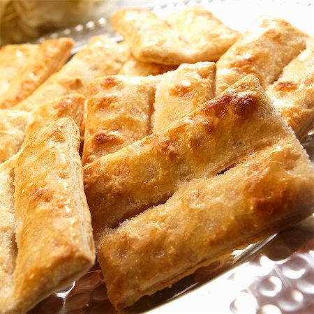puff pastry sweet - Bizchochos Dulces de Hojaldre; Argentine Sugar Glazed Pastries Stock Photo - Premium Royalty-Free, Code: 659-06186466