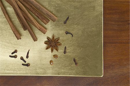 spice still life - Christmas spices (cinnamon sticks, cloves and star anise) Stock Photo - Premium Royalty-Free, Code: 659-06186702