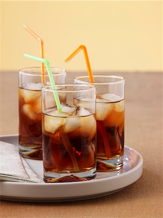 summer drinks - Three glasses of ice tea Foto de stock - Sin royalties Premium, Código: 659-06186772