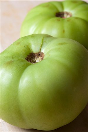 simsearch:659-06184463,k - New Jersey Beefsteak Green Tomatoes Stock Photo - Premium Royalty-Free, Code: 659-06186801