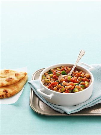 Chickpea curry with unleavened bread Stock Photo - Premium Royalty-Free, Code: 659-06186861