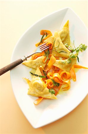 Rabbit-filled ravioli and grated carrot Stock Photo - Premium Royalty-Free, Code: 659-06187005