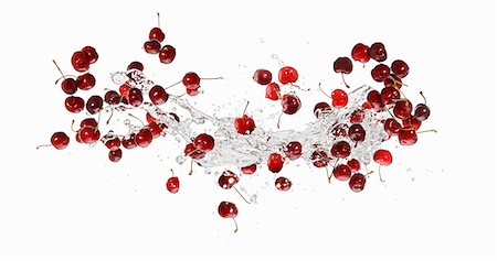 dropping (action) - Cerises et un soupçon d'eau Photographie de stock - Premium Libres de Droits, Code: 659-06187112