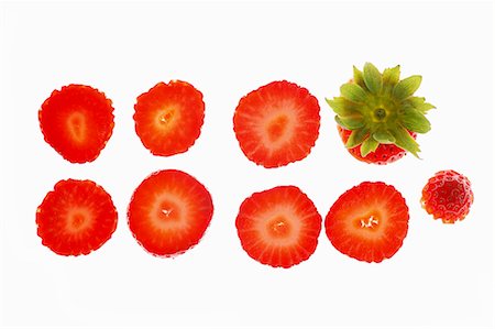 fraise - Une rangée de tranches de fraises Photographie de stock - Premium Libres de Droits, Code: 659-06187236