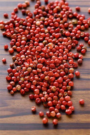 Heap of red peppercorns Stock Photo - Premium Royalty-Free, Image code: 659-06187342