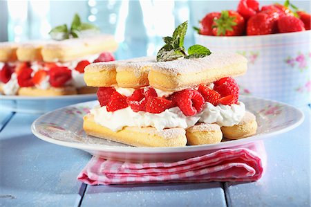 summer recipes - A layered dessert made of sponge fingers, cream and berries Stock Photo - Premium Royalty-Free, Code: 659-06187354