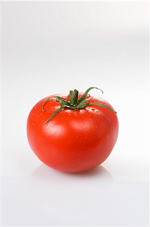 fresh tomato - A tomato Stock Photo - Premium Royalty-Free, Code: 659-06187352