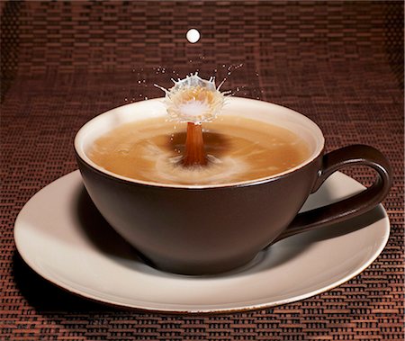 Drops falling into a latte Stock Photo - Premium Royalty-Free, Code: 659-06187470