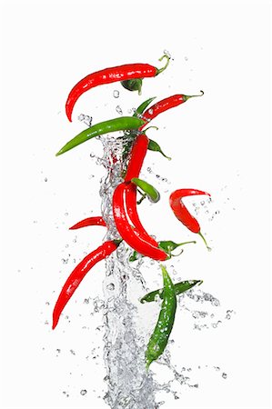 spray freshness - Airborne chillies and water Stock Photo - Premium Royalty-Free, Code: 659-06187853