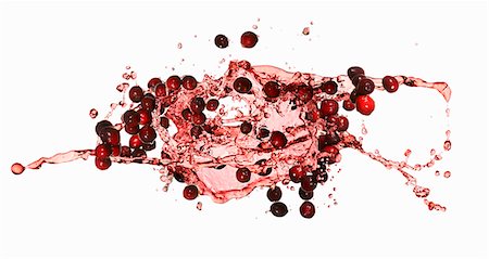 Cranberries with a juice splash Foto de stock - Sin royalties Premium, Código: 659-06188053