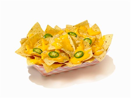 simsearch:659-08419869,k - Nachos with Cheese Sauce and Sliced Jalapenos in a Take Out Container Foto de stock - Sin royalties Premium, Código: 659-06188148