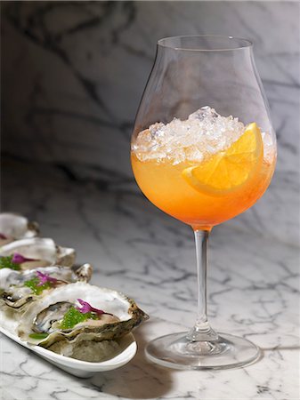 simsearch:659-08896969,k - Venetian Spritz with Oysters on the Half Shell Stock Photo - Premium Royalty-Free, Code: 659-06188189