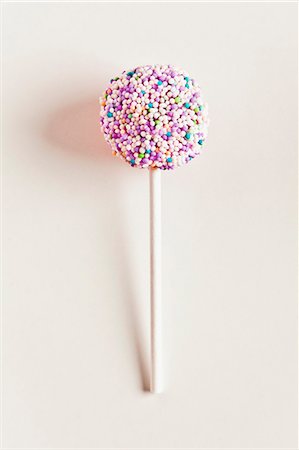 sugar pearl - A cake pop decorated with sugar sprinkles Stock Photo - Premium Royalty-Free, Code: 659-06188330