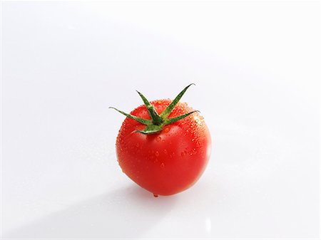 A tomato Stock Photo - Premium Royalty-Free, Code: 659-06188365