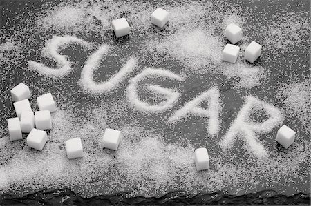 The word SUGAR written in sugar Foto de stock - Sin royalties Premium, Código: 659-06188378