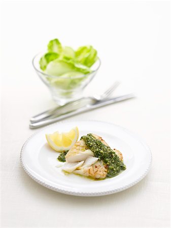 fish isolated on white background - Cod with pesto and lemon Stock Photo - Premium Royalty-Free, Code: 659-06188505