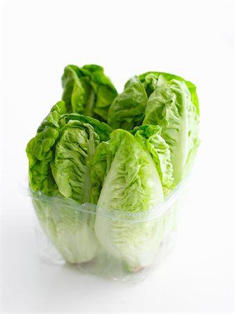 Lettuces in a plastic container Foto de stock - Sin royalties Premium, Código: 659-06188528