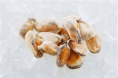 frozen food ice - Frozen mussels without their shells Stock Photo - Premium Royalty-Free, Code: 659-06183754