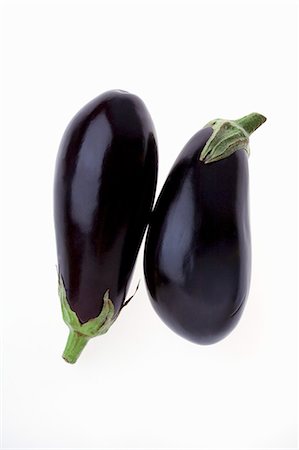 Two Whole Eggplant on a White Background Stock Photo - Premium Royalty-Free, Code: 659-06183789