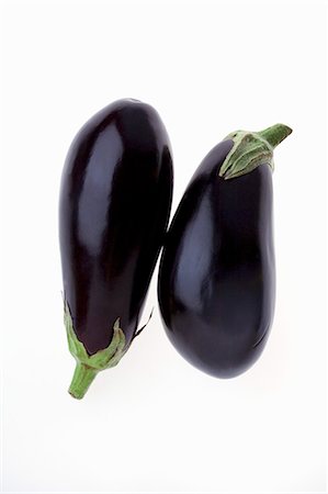 simsearch:659-06373778,k - Two Whole Eggplant on a White Background Foto de stock - Sin royalties Premium, Código: 659-06183789