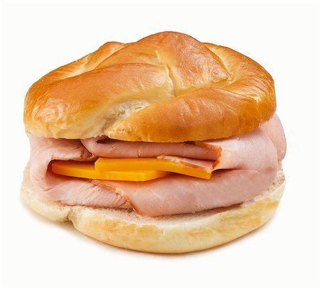 food lunch on white background - Ham and Cheese Sandwich on Pretzel Roll; White Background Stock Photo - Premium Royalty-Free, Code: 659-06183842