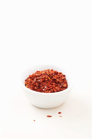 seasonings ingredients - Un bol de flocons de piment Photographie de stock - Premium Libres de Droits, Code: 659-06183863