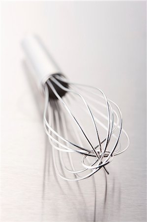 A whisk on a metal surface Stock Photo - Premium Royalty-Free, Code: 659-06183913